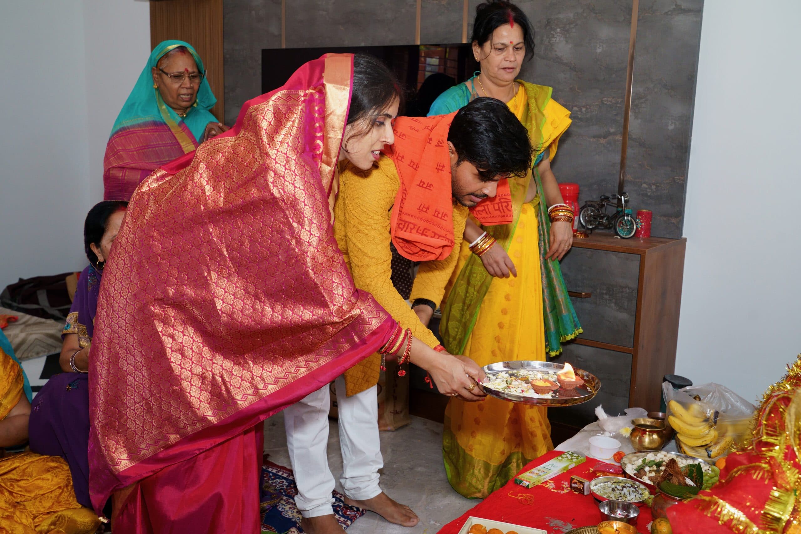 Aarti being performed at the new home